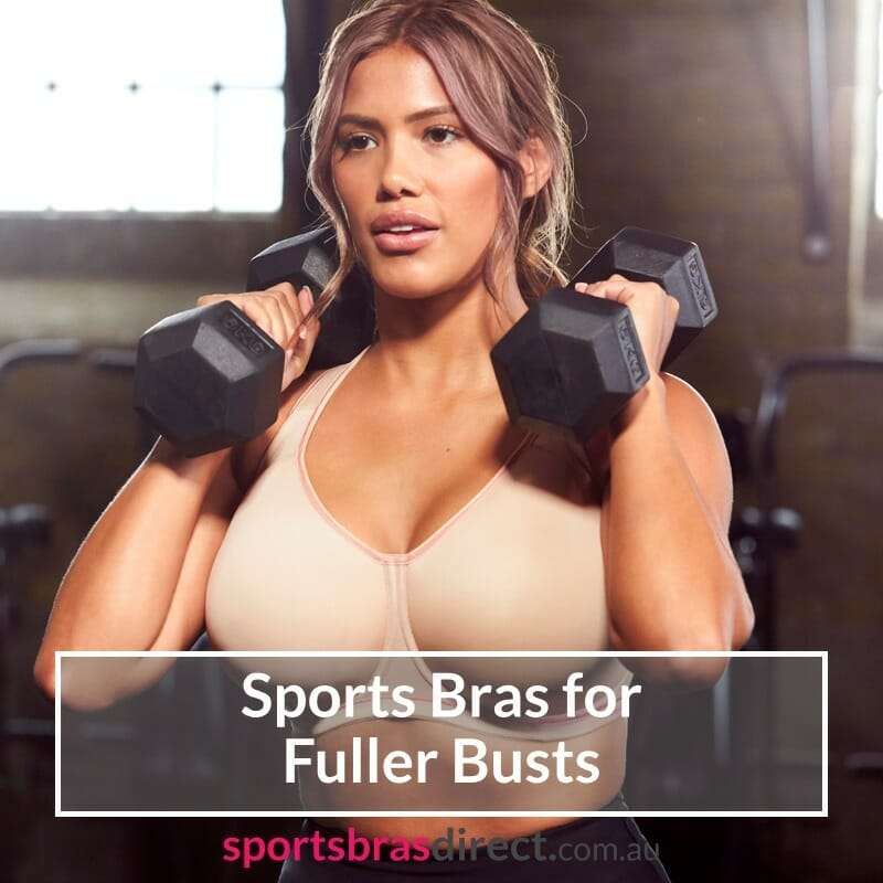 Woman doing weights in a Cream coloured sports bra.