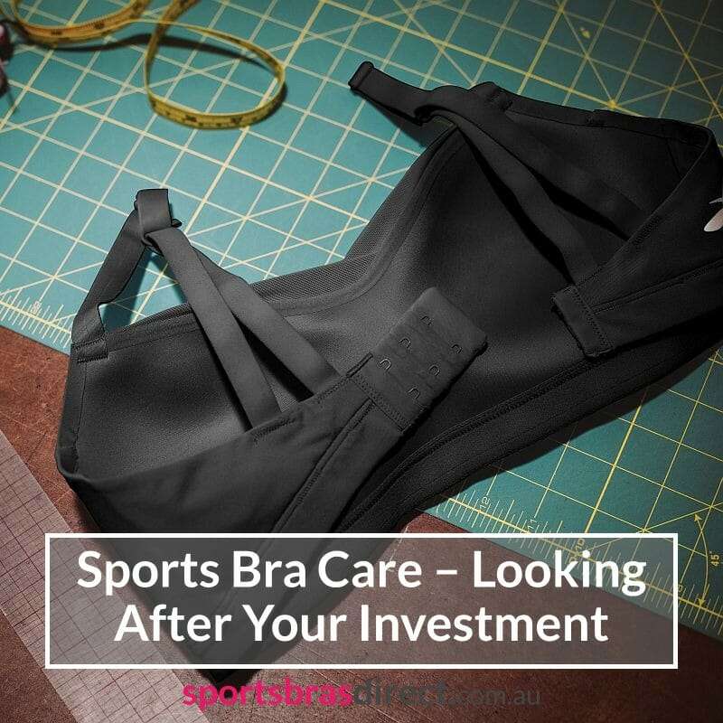 A Black bra laid on a table.