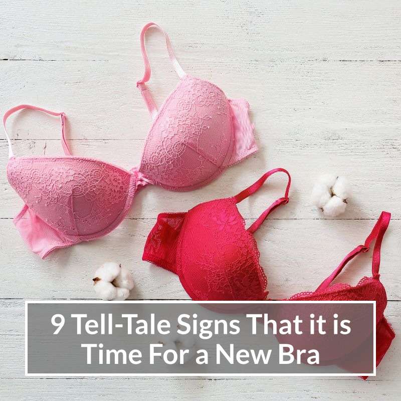 Two bras laying on a table.