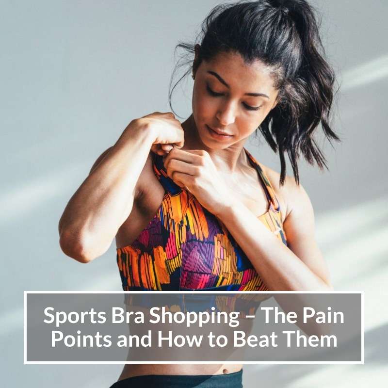 Woman adjusting the shoulder strap of a colourful sports bra